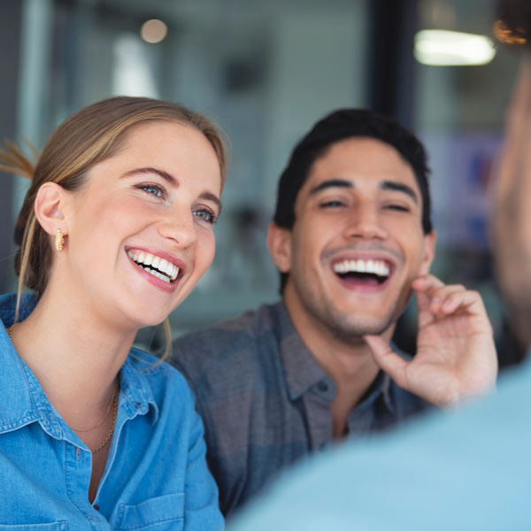 young adult couple laughing
