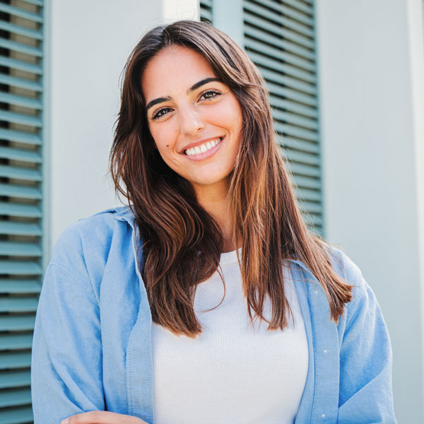 woman smiling and looking at the camera